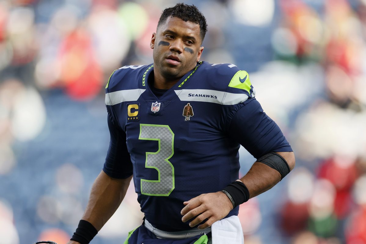 Russell Wilson of the Seattle Seahawks warms up before a game against the San Francisco 49ers at Lumen Field