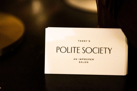 A card tucked into a mirror reads "Tansy's Polite Society"