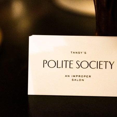A card tucked into a mirror reads "Tansy's Polite Society"