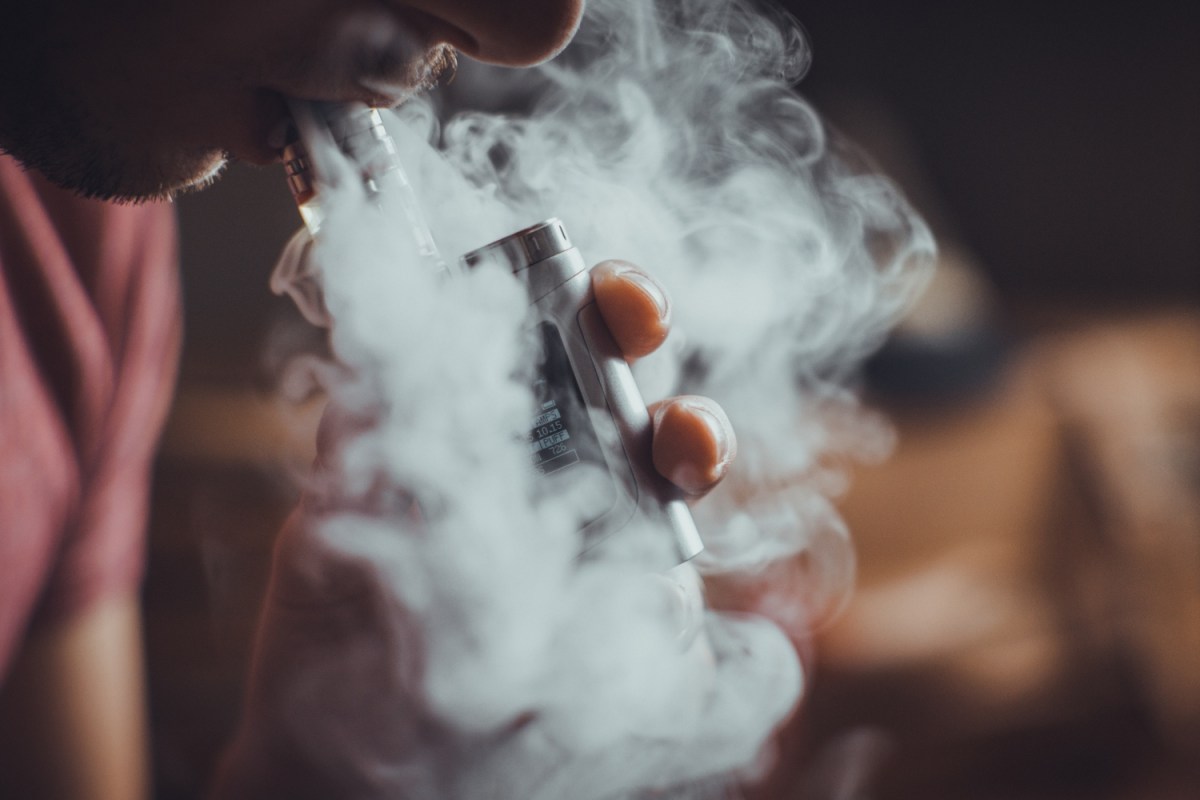Close-Up Photo Of Person Smoking - vaping has been linked to erectile dysfunction in a new study