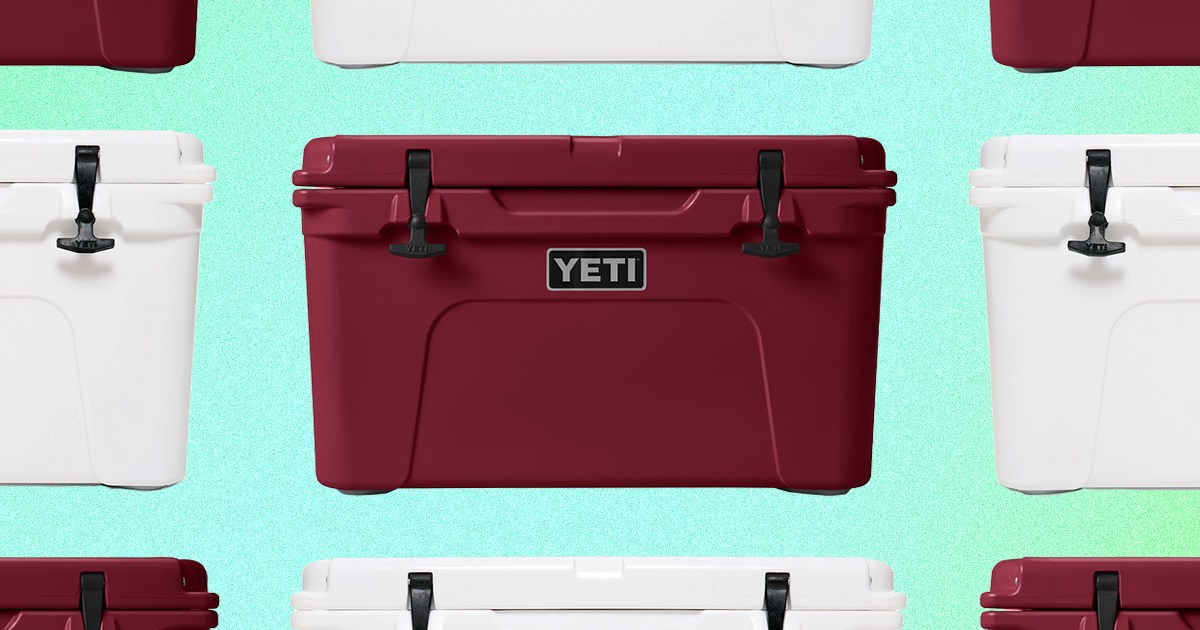 A grid of red and white Tundra hard coolers from Yeti on a green background. Yeti is offering free expedited shipping for guaranteed Christmas Eve delivery.