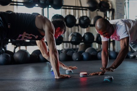 Two men using BlazePods.