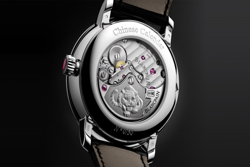 a watch complete with design and ascription celebrating the new year on the back