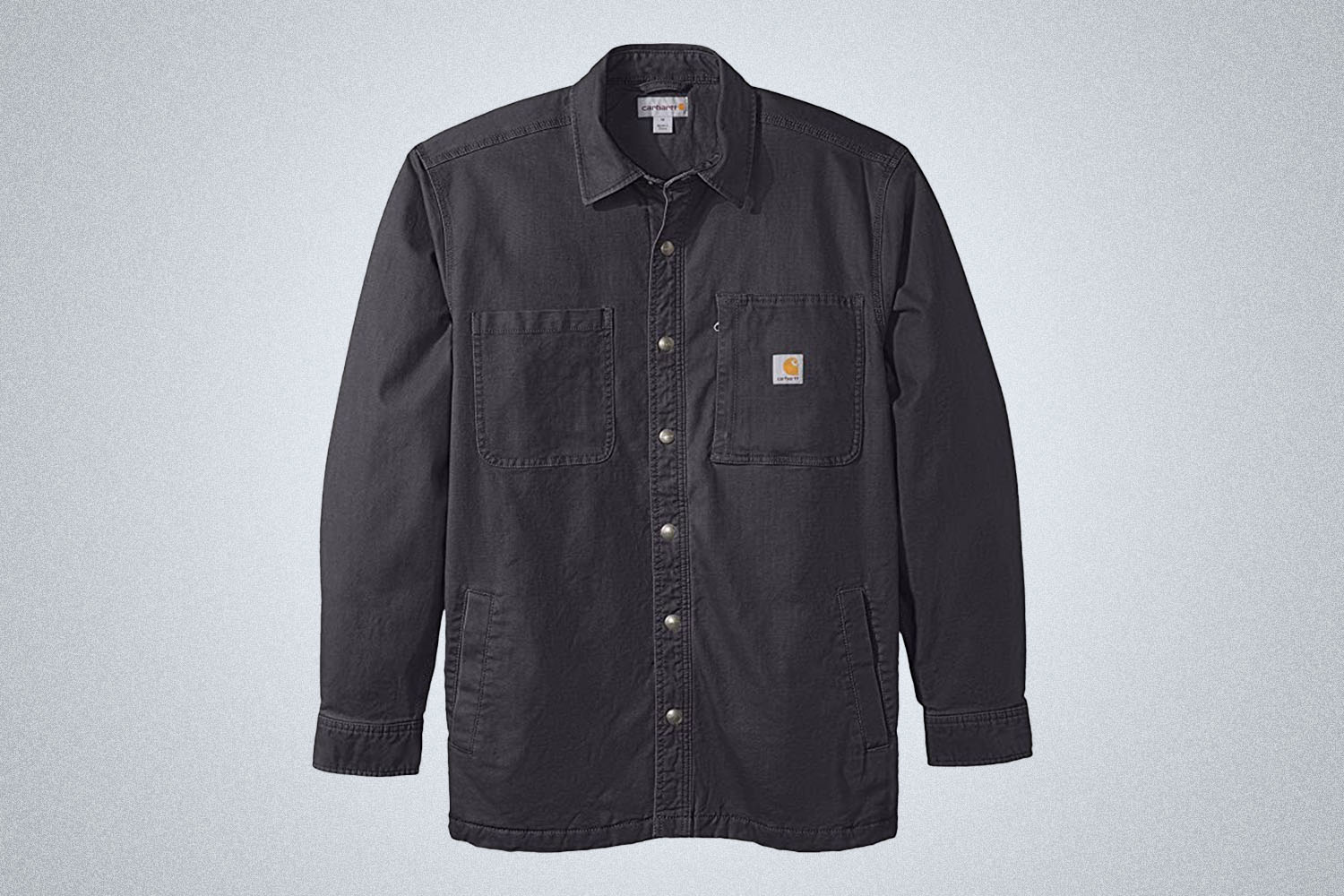 A grey overshirt from Carhartt on a grey background