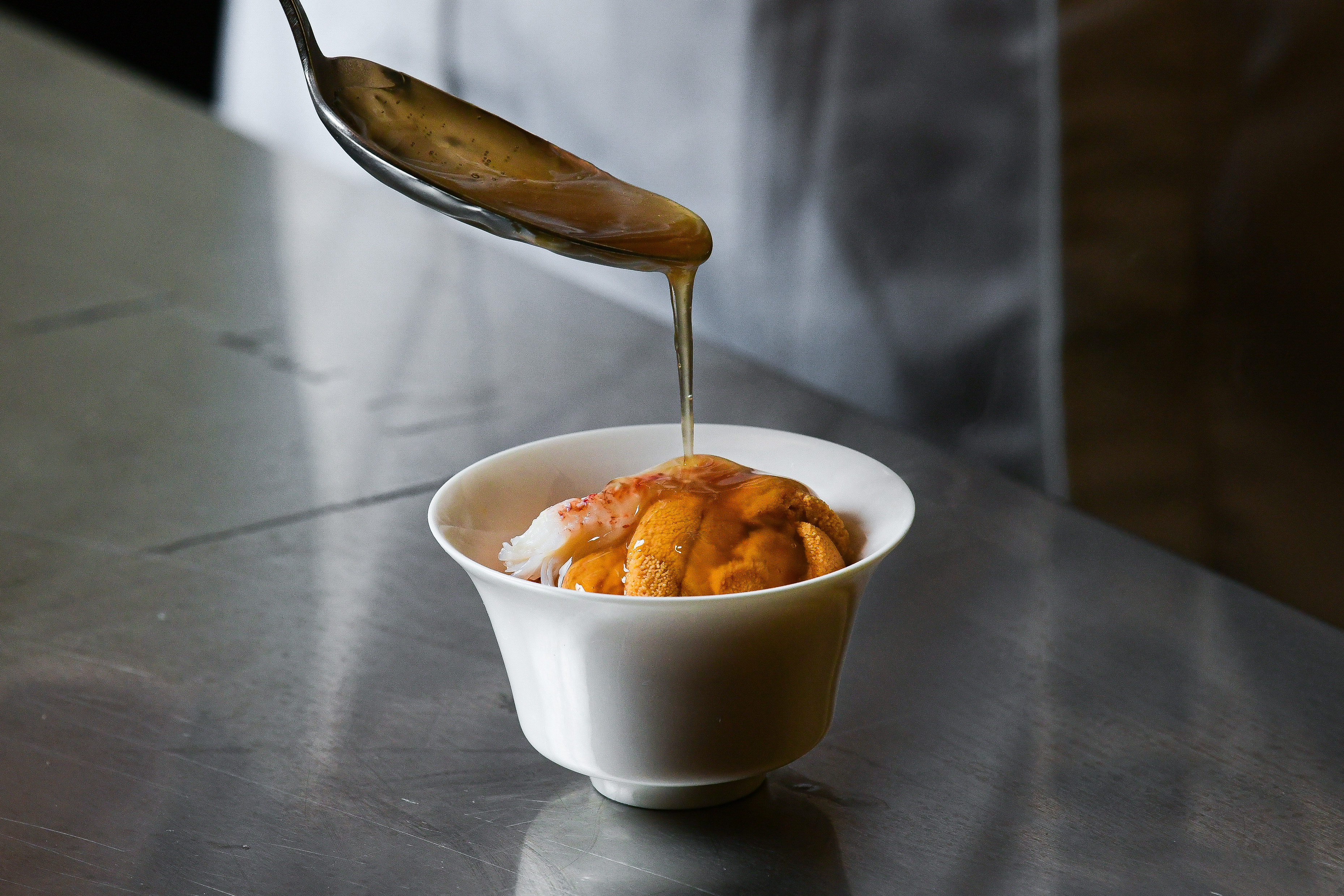 The chawanmushi, a savory egg custard, features delicate strips of uni