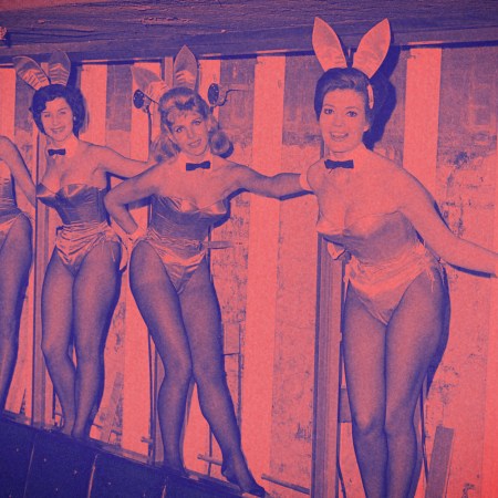 Playboy bunnies line the wall at the Playboy club
