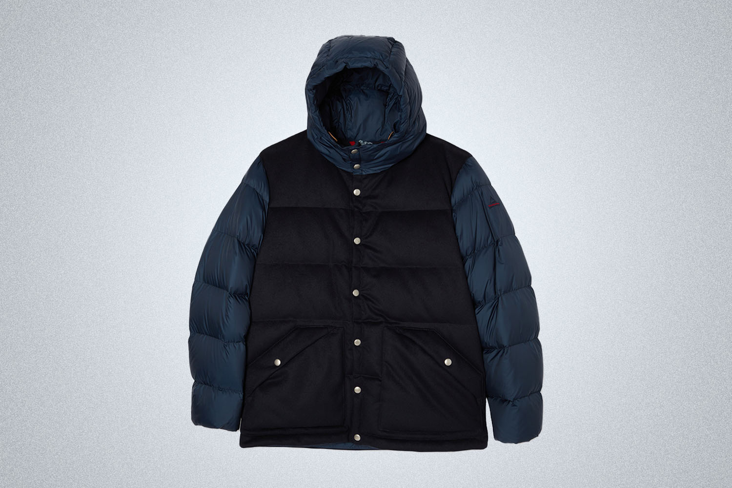 a two-toned black and blue puffer jacket with hood