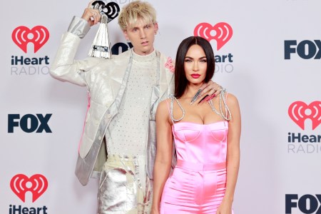 Machine Gun Kelly, winner of the Alternative Rock Album of the Year award for 'Tickets To My Downfall,’ and Megan Fox attend the 2021 iHeartRadio Music Awards at The Dolby Theatre in Los Angeles, California, which was broadcast live on FOX on May 27, 2021.