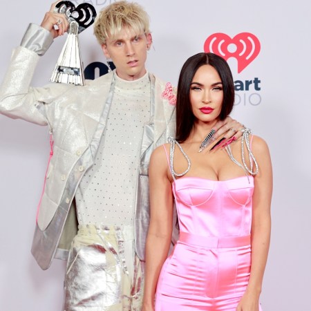 Machine Gun Kelly, winner of the Alternative Rock Album of the Year award for 'Tickets To My Downfall,’ and Megan Fox attend the 2021 iHeartRadio Music Awards at The Dolby Theatre in Los Angeles, California, which was broadcast live on FOX on May 27, 2021.