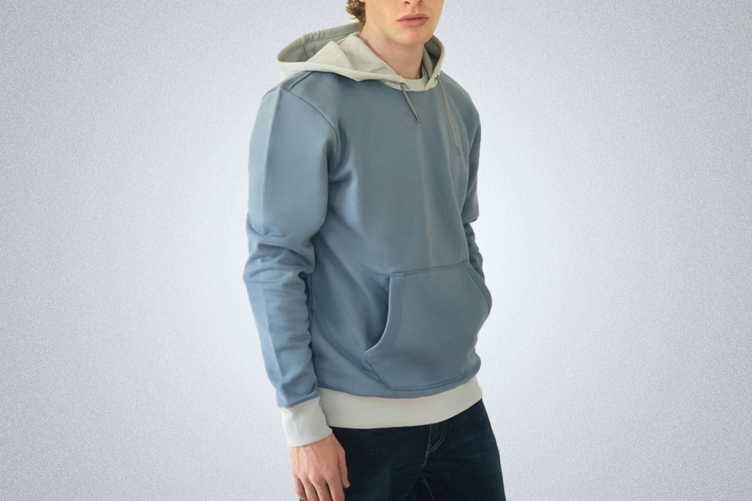 a model in a two-toned hoodie