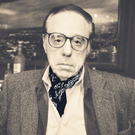Peter Bogdanovich wearing a sportcoat and his ever-present bandana