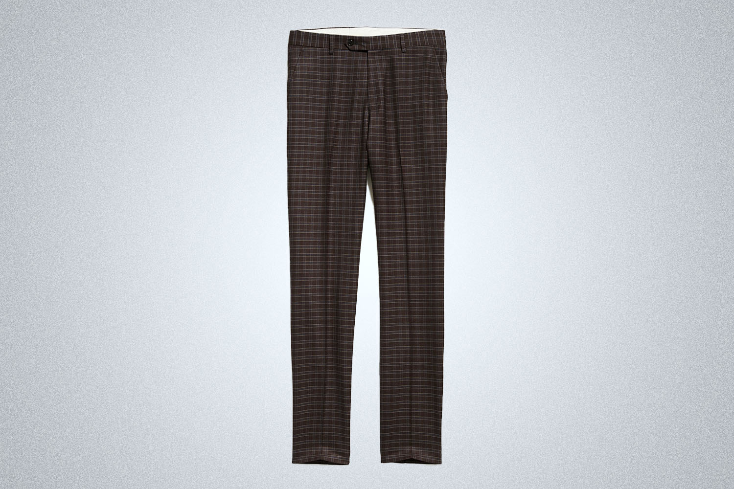 a pair of brown checked dress pants