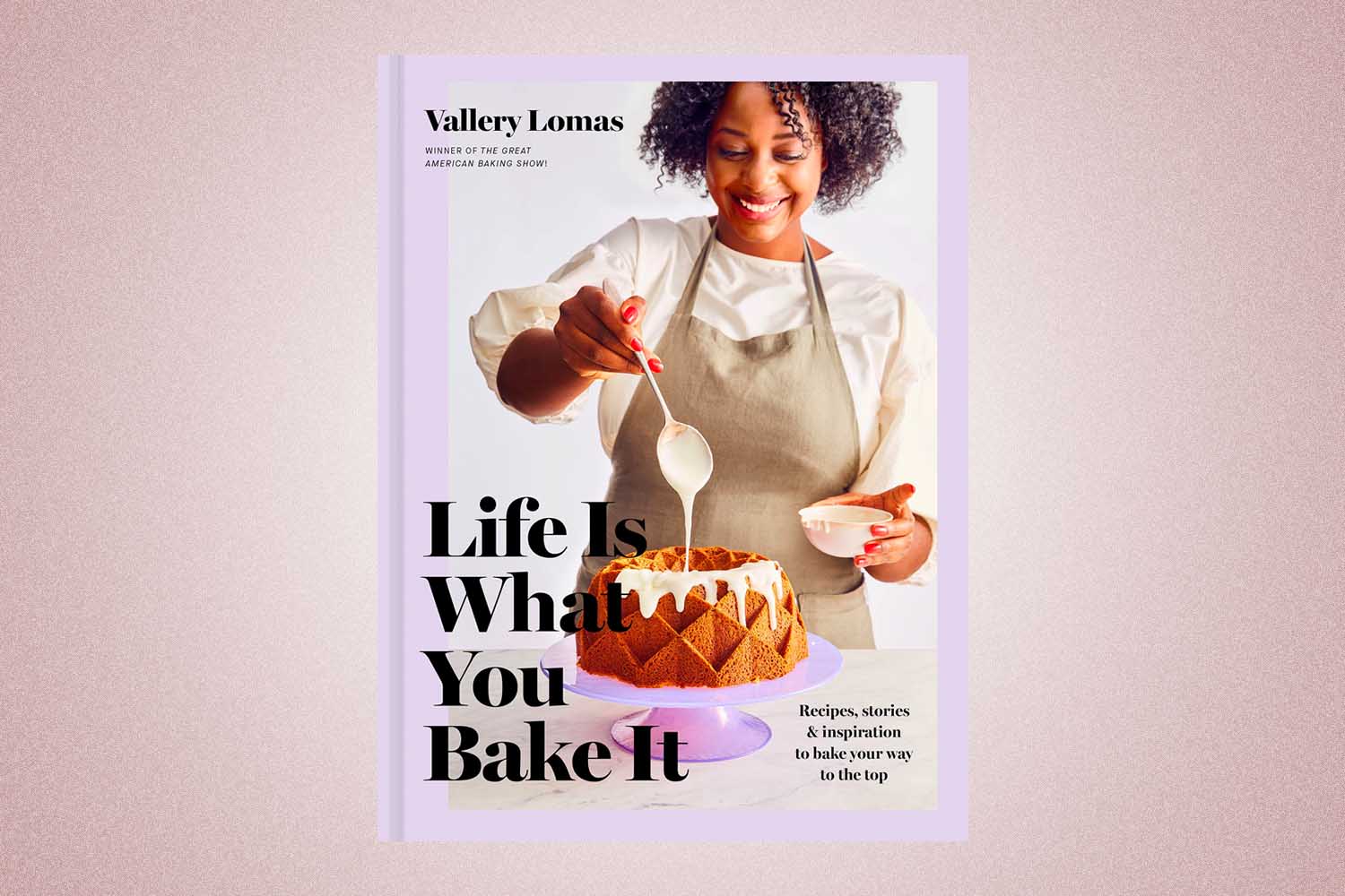 The cover of the book "Life Is What You Bake It: Recipes, Stories, and Inspiration to Bake Your Way to the Top: A Baking Book" with a woman glazing a cake, a perfect Valentine’s Day gift for 2022, on a pink background.