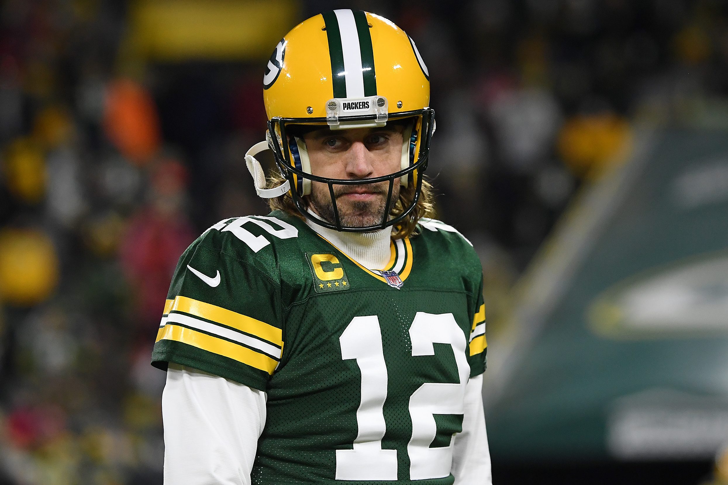 Aaron Rodgers of the Green Bay Packers warms up prior to the NFC Divisional Playoff game against the 49ers