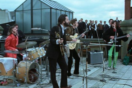 The Beatles perform their rooftop concert in 1969.