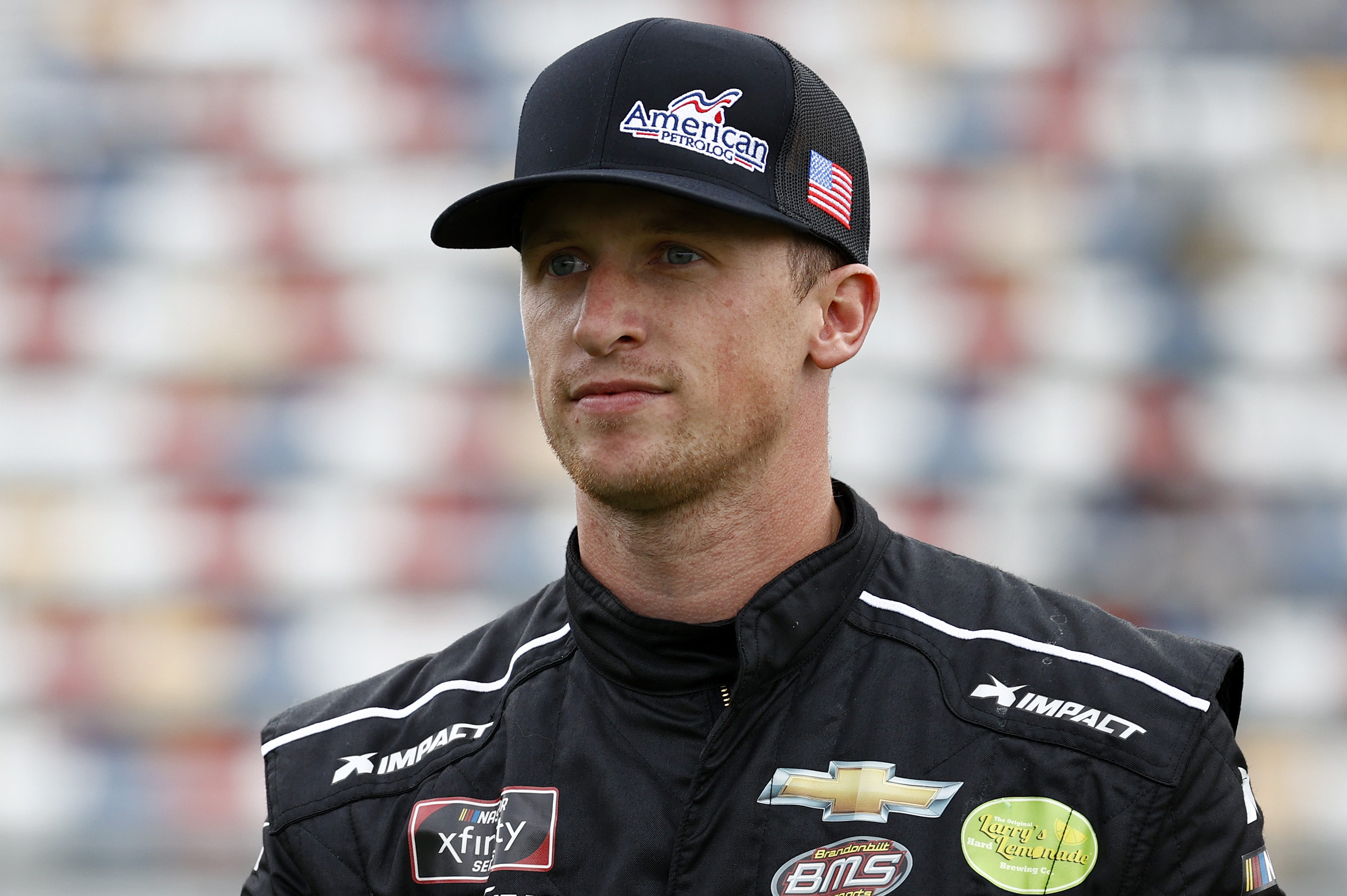 Brandon Brown walks the grid prior to the NASCAR Xfinity Series Drive for the Cure 250. NASCAR nixed the driver's “Let’s Go, Brandon” cryptocurrency sponsorship deal