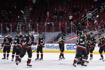 The Arizona Coyotes salute the limited attendance fans at Gila River Arena in Glendale. The team may use a small ASU arena for the next few years while a new arena is built.