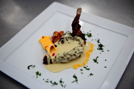A dish made of cuy (Guinea pig) meat, prepared during a class at the Pachacutec Cooking Institute, northern outskirts of Lima on September 23, 2011