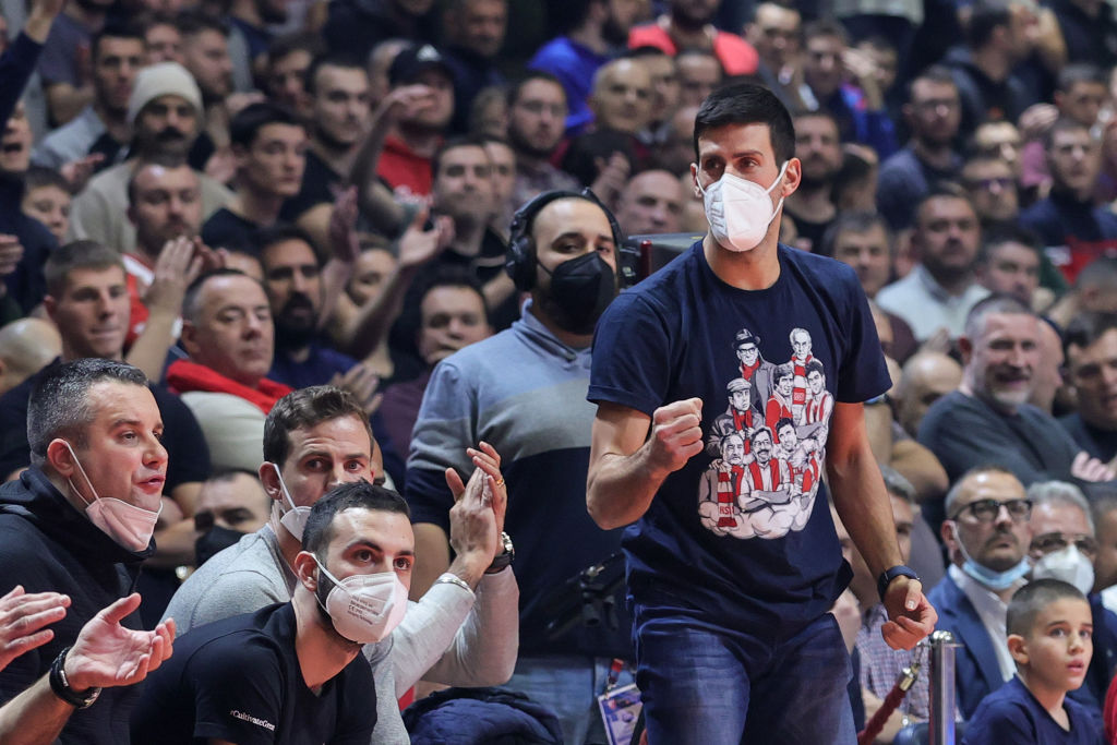 Serbian tennis star Novak Djokovic wearing a face mask. The 34-year-old recently had his visa restored after being detained in Australia ahead of the Australian Open in 2022.