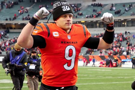 Joe Burrow leaves the field after beating the Kansas City Chiefs 34-31