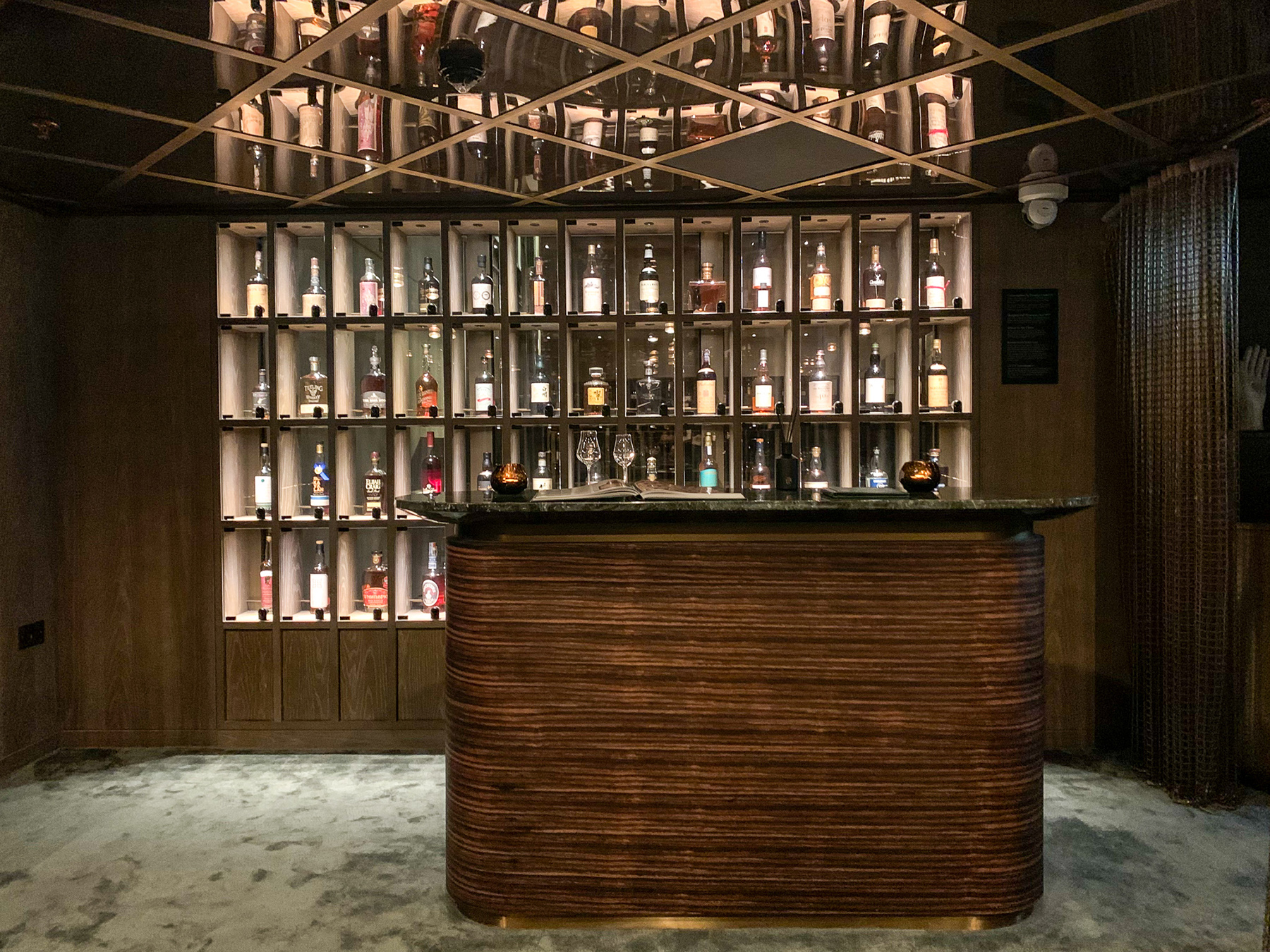 Guests only "Residence" offers a private whiskey bar with over 50 bottles