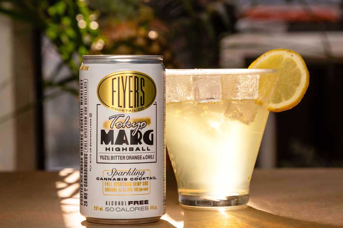 A can of Flyers Tokyo Marg and some of it poured into a glass of ice