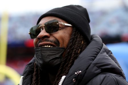 Ex-Bills player Marshawn Lynch on the field before a game against the Indianapolis Colts