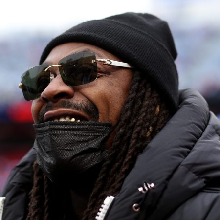 Ex-Bills player Marshawn Lynch on the field before a game against the Indianapolis Colts