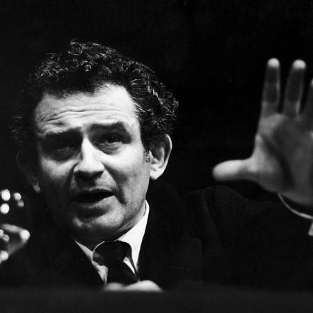 Author Norman Mailer pictured in a black and white photograph at a discussion in the Mayfair Theater in London