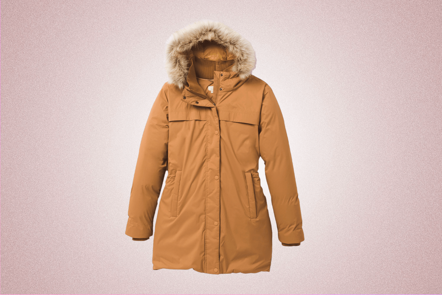 A long tan parka jacket with a fur good from Prana, a perfect Valentine’s Day gift for 2022, on a pink background.
