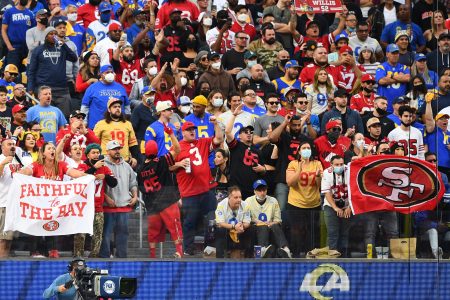 San Francisco 49ers fans cheer against the Los Angeles Rams at SoFi Stadium. There might be a large contingent of 49ers fans at the playoff game Sunday, which is a home game for the Rams in L.A.