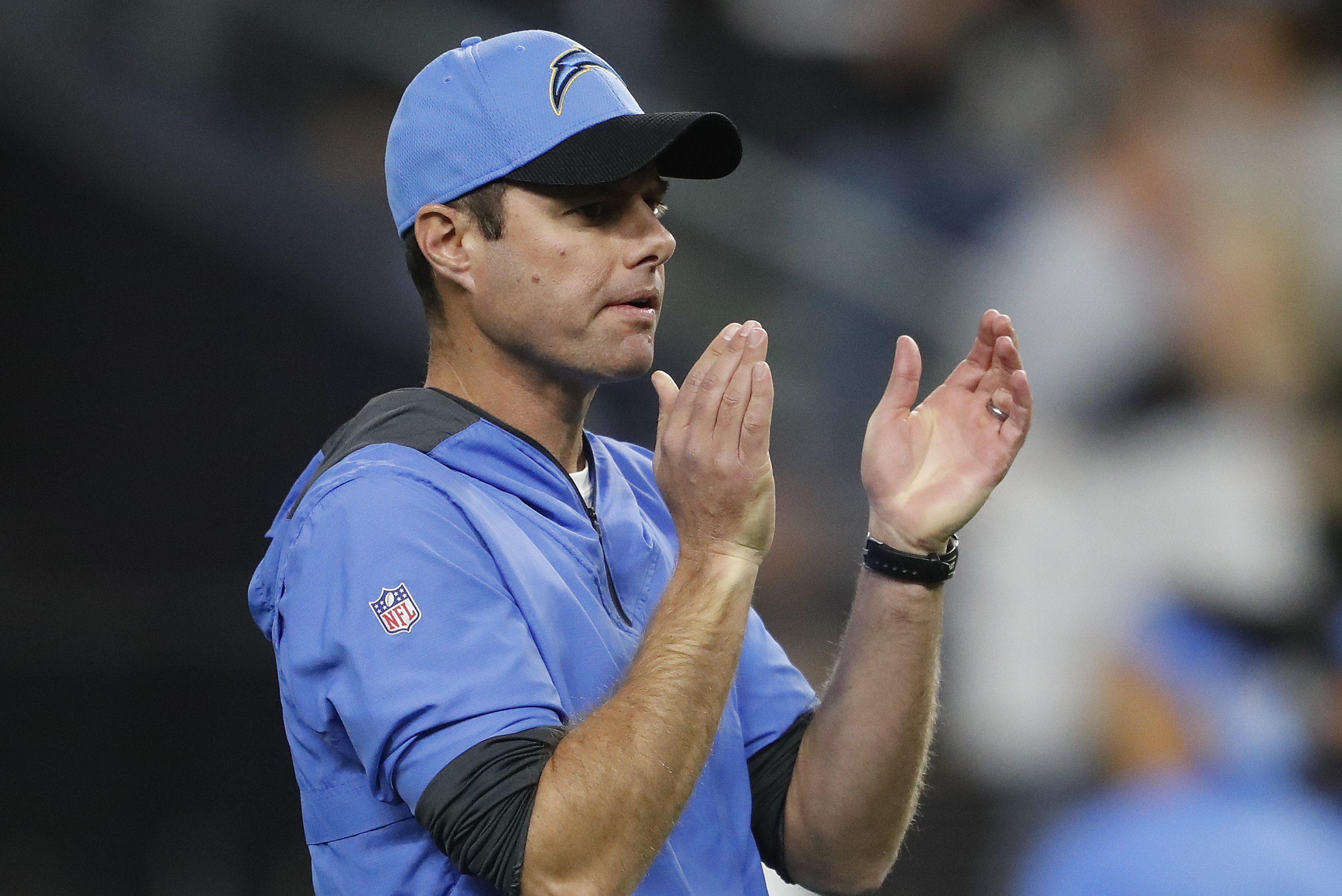 Coach Brandon Staley of the LA Chargers looks on before coaching against the Raiders at Allegiant Stadium in January 2022