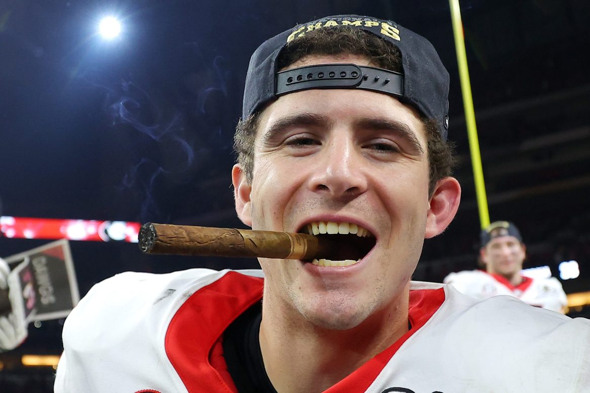 Stetson Bennett celebrates after the Georgia Bulldogs defeated the Alabama Crimson Tide 33-18 in the 2022 CFP National Championship Game