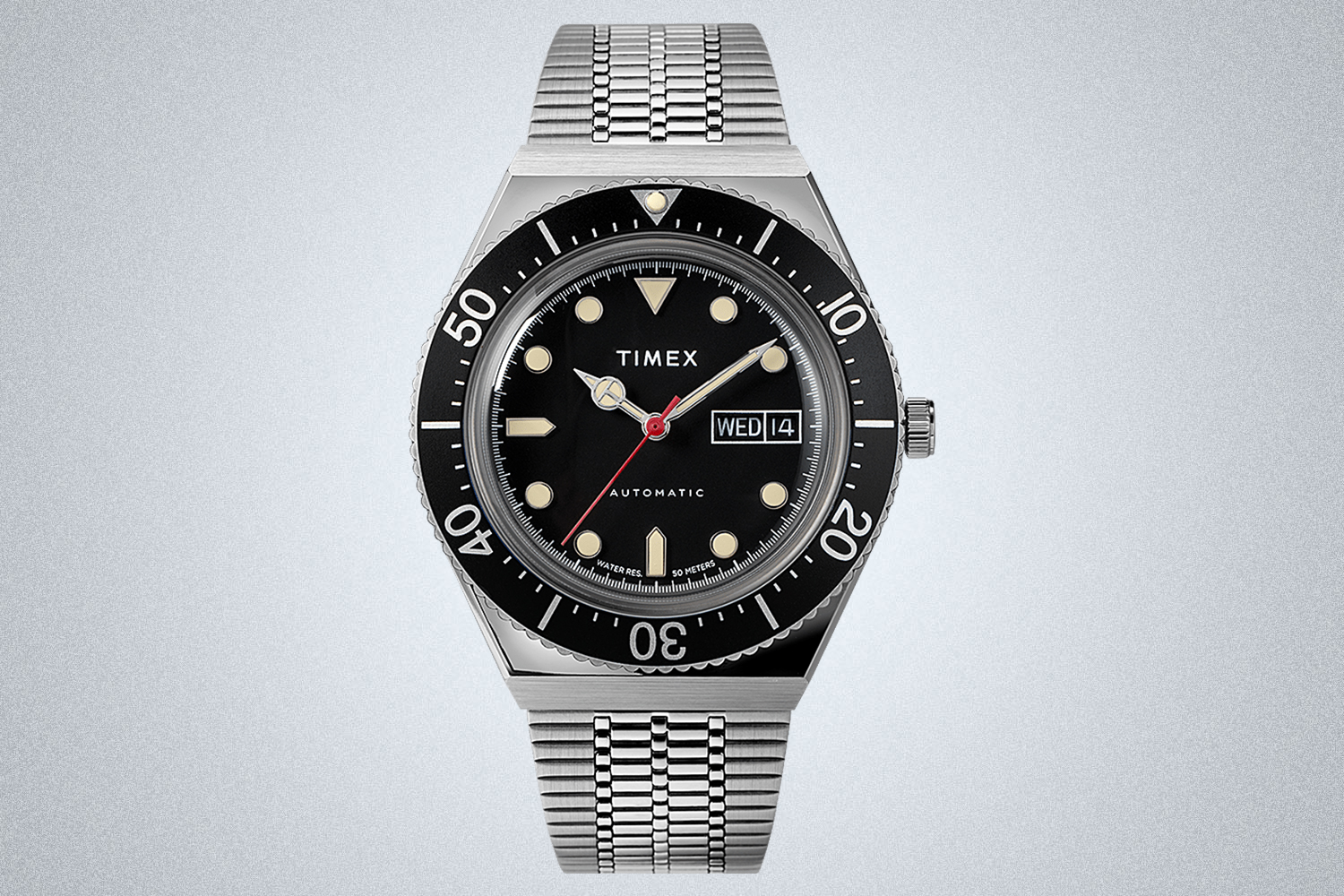 The Timex M79 Automatic men's watch with a black dial and bezel