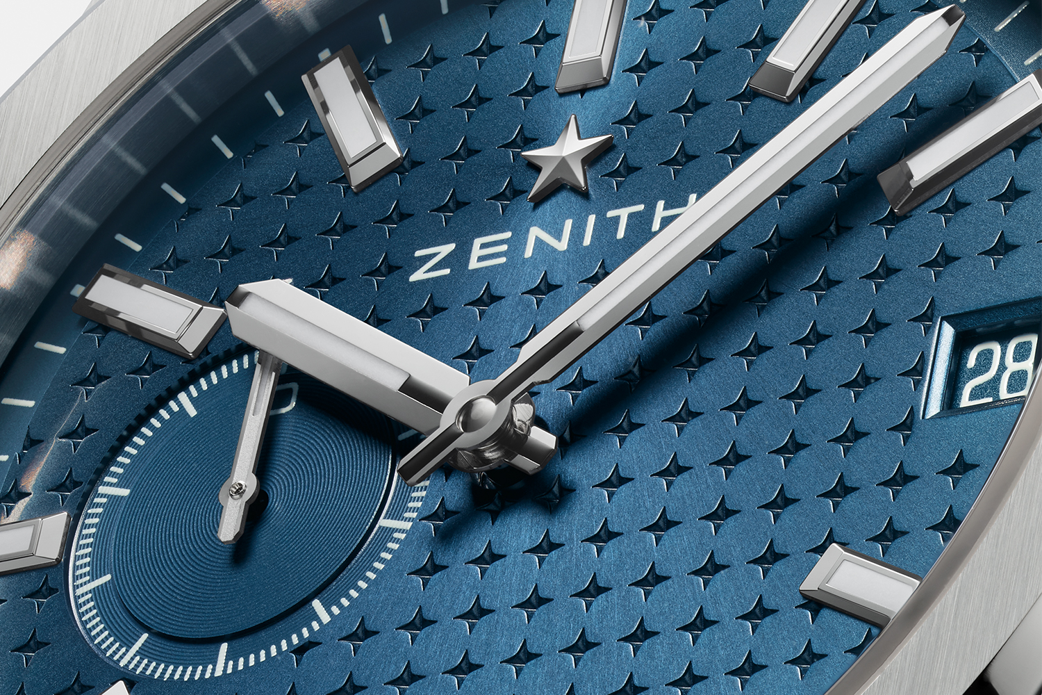 A close-up of the Zenith Defy Skyline watch, featuring a tenth of a second sub-dial and a four-pointed star patten on the dial