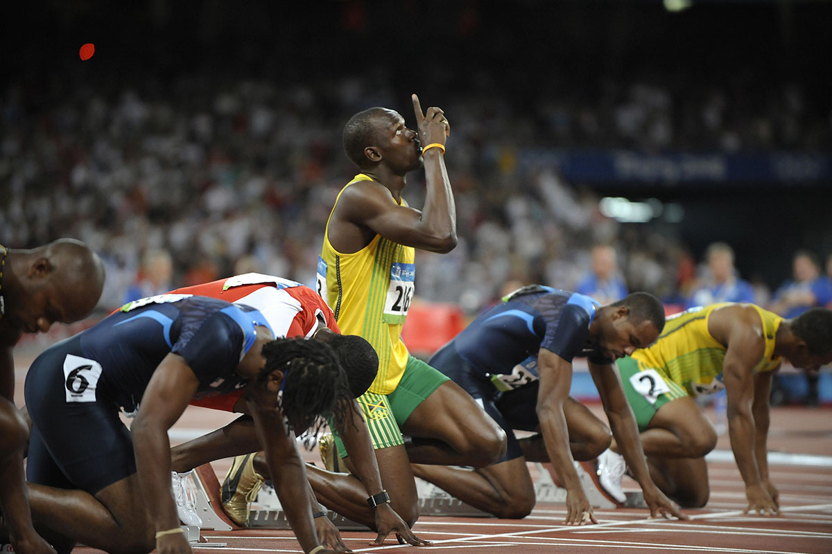 Usain Bolt at the starting line during the Beijing Olympics in 2008. According to his autobiography, Bolt was eating 100 McDonald's chicken nuggets a day during those Olympics — the only thing he ate for breakfast, lunch and dinner.
