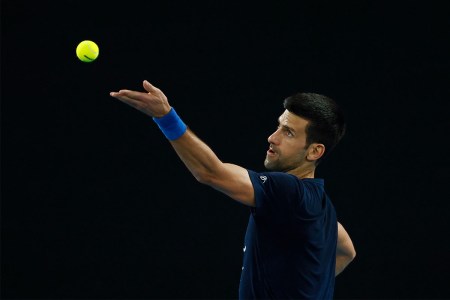 Novak Djokovic throws a tennis ball into the air. In a new interview with the BCC, the tennis star confirmed that his is not vaccinated against COVID-19 and has no plans to get a vaccine.