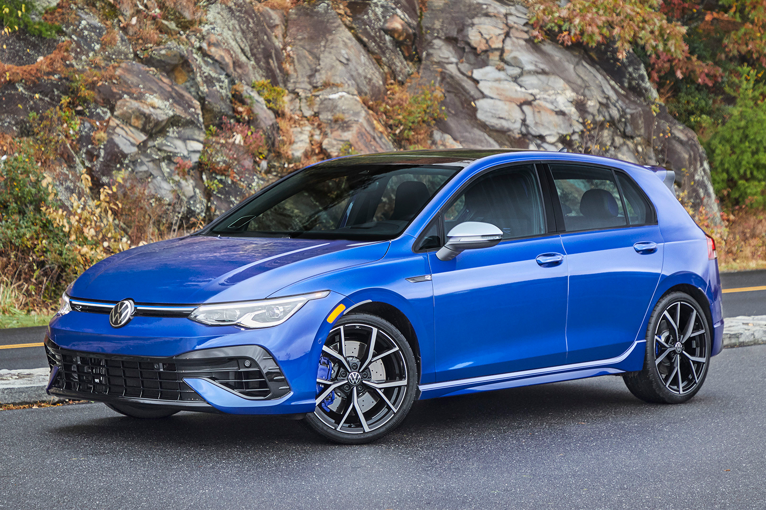 The 2022 Volkswagen Golf R hot hatch in blue. We tested and reviewed the hatchback to see how it compares to older generations.