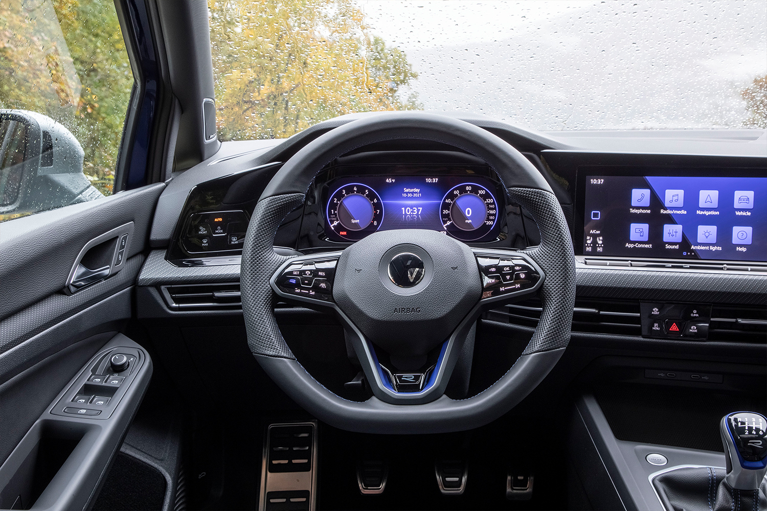 The steering wheel of the new 2022 Volkswagen Golf R hatchback, which we found to be less responsive than we would like during our testing and reviewing process