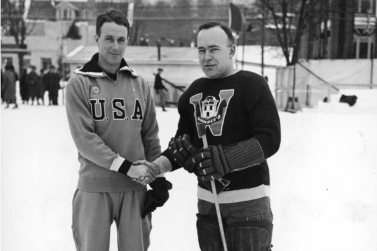 The Canadian and USA hockey captains shaking hands at the 1932 olympics 