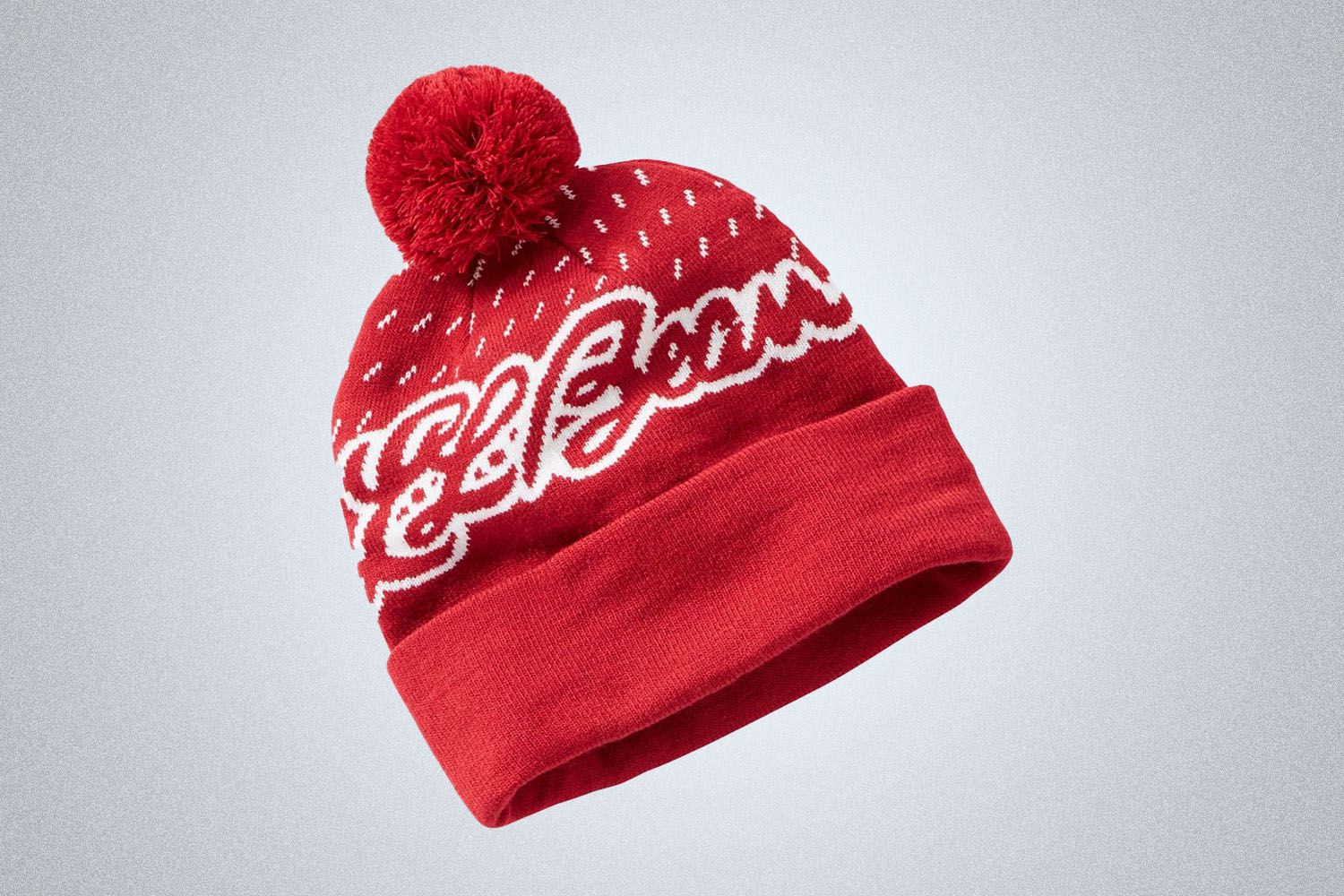 a red pom pot hat with L.L. Bean logo