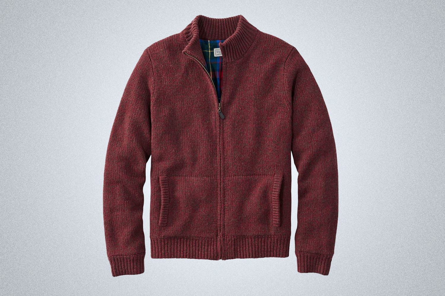 a maroon zip sweater