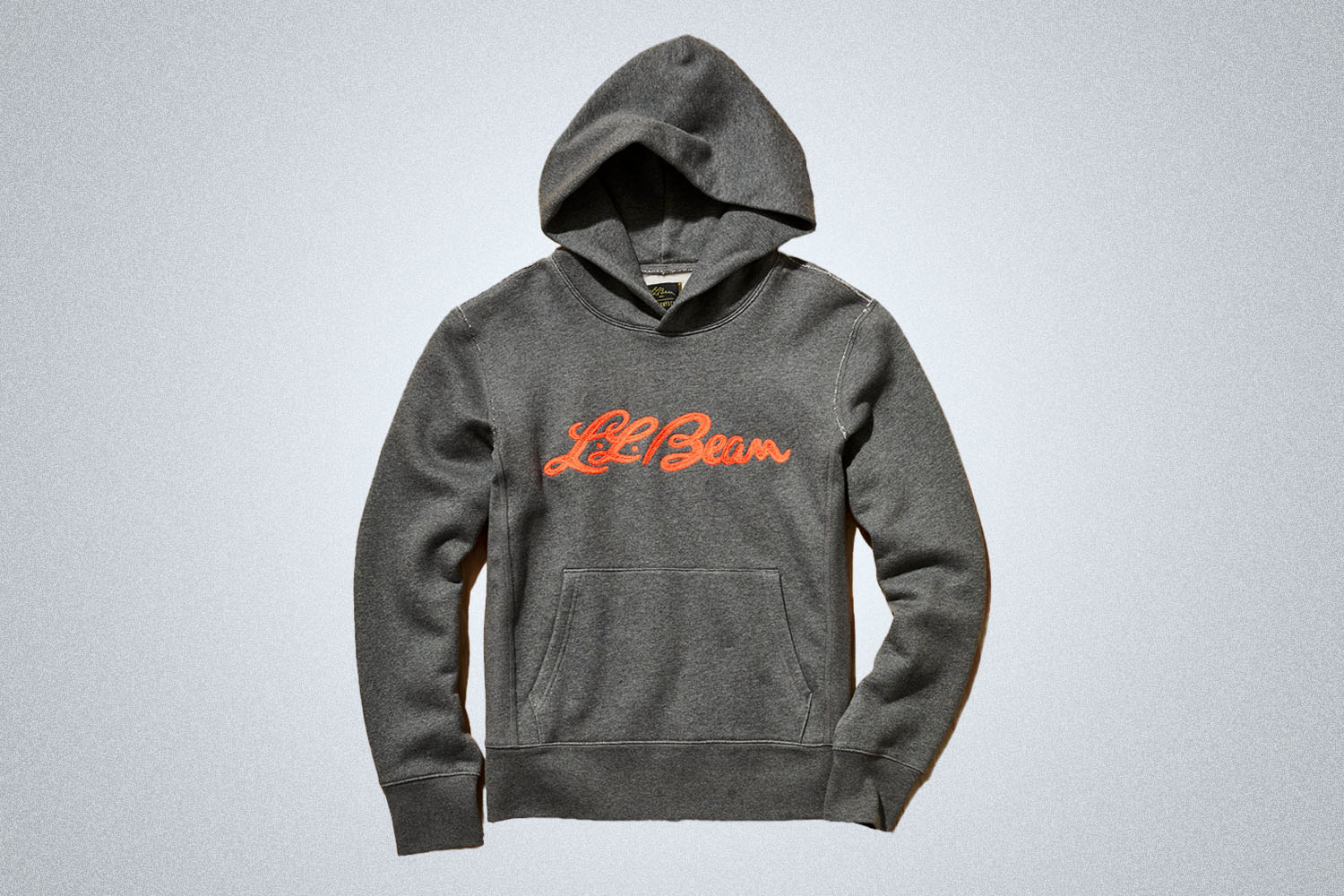 a grey hoodie with orange script from Todd Snyder