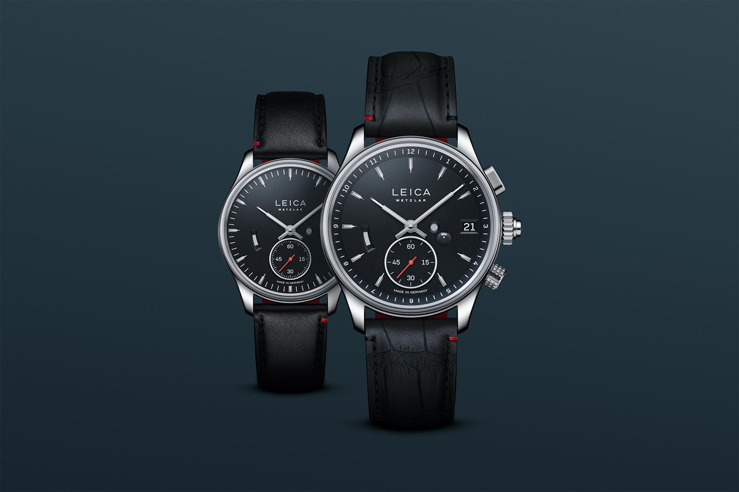 two watches on a deep navy background