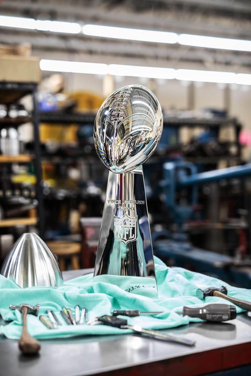 The sterling silver Lombardi Trophy tips the scales at seven pounds and measures in at 22 inches.