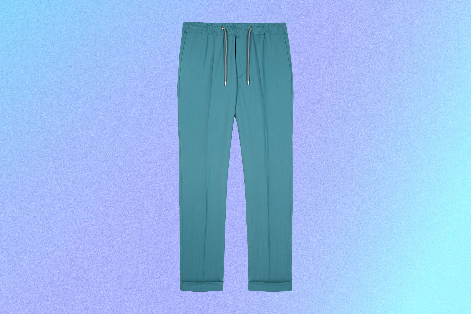 A pair of wool drawstring pants in a turquoise blue on a multi-colored blue-purple background