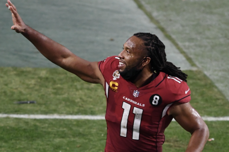 Wide receiver Larry waves to fans at State Farm Stadium in 2020
