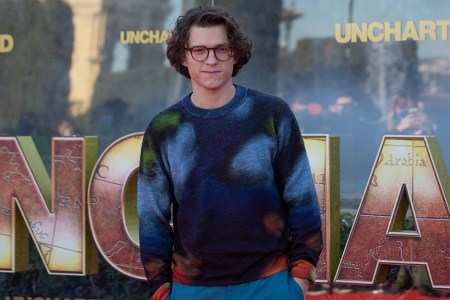 Tom Holland in a Paul Smith jumper and pants on the red carpet in Barcelona