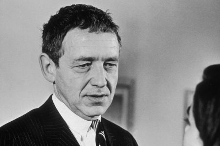 Painter Andrew Wyeth in a black and white photograph