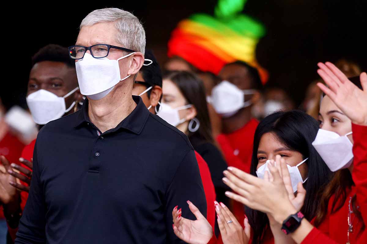 Apple CEO Tim Cook (CENTER L) attends the grand opening event of the new Apple store at The Grove on November 19, 2021 in Los Angeles, California. The tech company just topped Fortune's Most Admired Companies list.